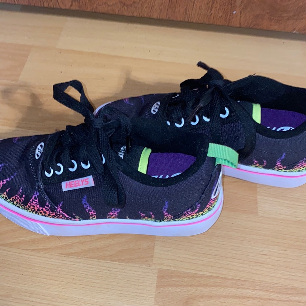 Lightly worn Like new Heelys.